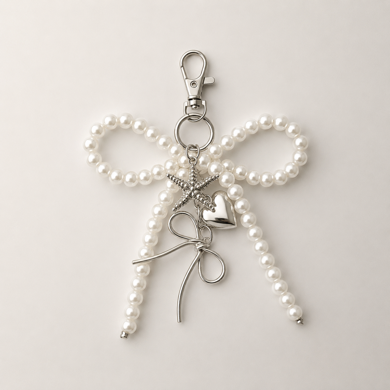 Pearl Tide Bow Charm